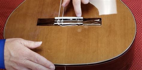 Stringing Nylon String Guitar 的图像结果