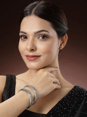 Buy NVR Women Set of 2 Silver-Toned German Peacock Design Oxidised Kada ...