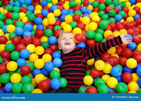 Happy Little Boy Having Fun in Ball Pit with Colorful Balls Stock Photo ...