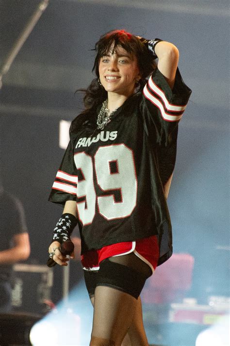 Billie Eilish's Oversize "FAMOUS" Jersey, Sheer Biker Shorts | PS Fashion
