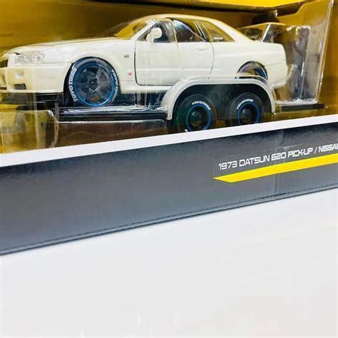 خرید ماکت فلزی مایستو دیزاین «1973 داتسون 620 پیکاپ با نیسان اسکای لاین ...