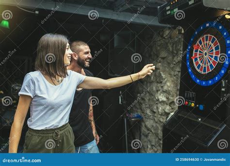 Playing darts has never been so sexy, strip style!