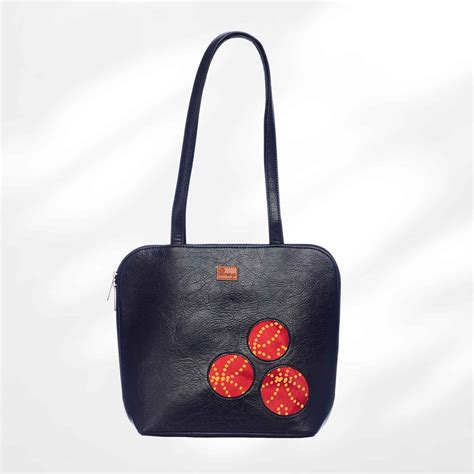 Round Corner Leather Cutwork Bags