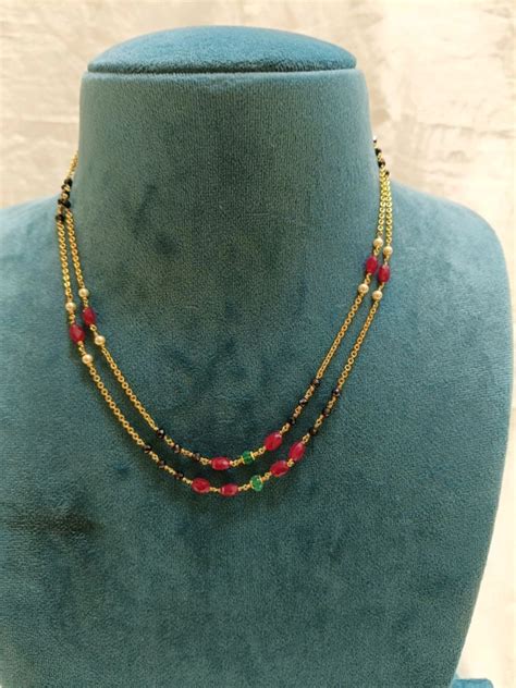 Black Beads 2 lines with Manulu