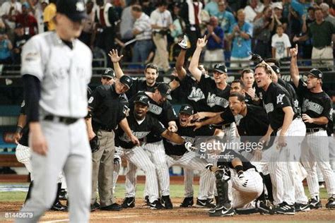 World Series, Florida Marlins victorious and pointing to home plate ...