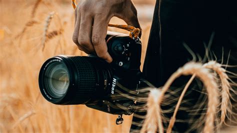 Download wallpaper 1920x1080 camera, hand, ears, photographer full hd ...