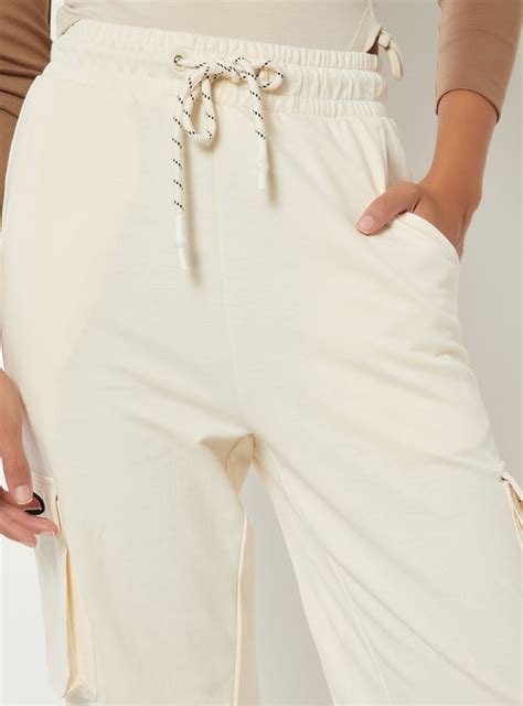 Buy Women Solid Cargo Joggers Online at just Rs. 999.0 - 1000015569822 ...