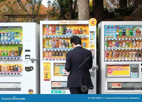 Salaryman Buying on Vending Machine. Japanese Man Worker Buys Drinks on ...