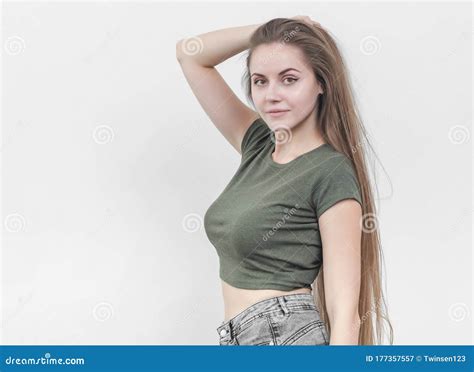 Nice Girl with Beautiful Breasts in a Green T-shirt Posing on Ca Stock Image - Image of blank ...
