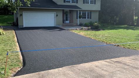 Driving On New Asphalt Driveway