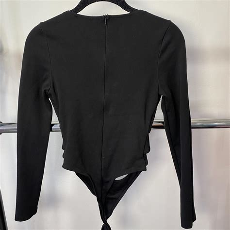 FRONT CUT OUT LONG SLEEVE BODYSUIT - Depop