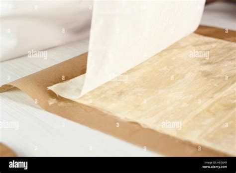 Stacking filo pastry sheet. Making Filo Pastry Topped Apple Pie Series ...