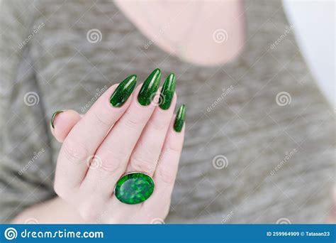 Hand with Long Nails and Emerald Green Nail Polish Stock Image - Image ...