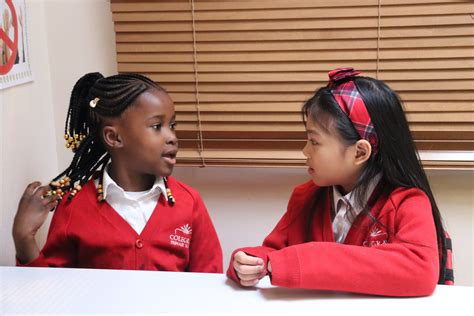 Elementary Students Talking To Each Other