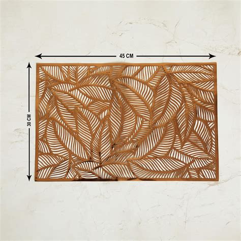 Buy Cinder PVC Leaf Cut-Work Placemat from Home Centre at just INR 349.0