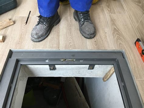 Interior trapdoor covered with laminate flooring — KMF LUKE — custom ...
