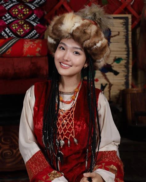 Kyrgyz singer Aiyma in traditional costume. | Mongolian hairstyles ...