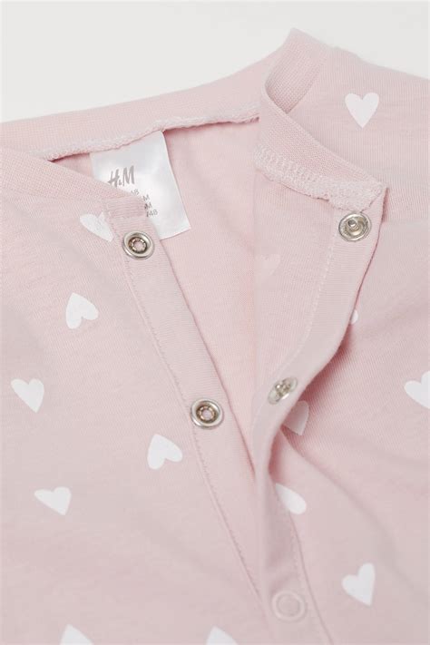 Printed all-in-one pyjamas - Light pink/Hearts - Kids | H&M IN