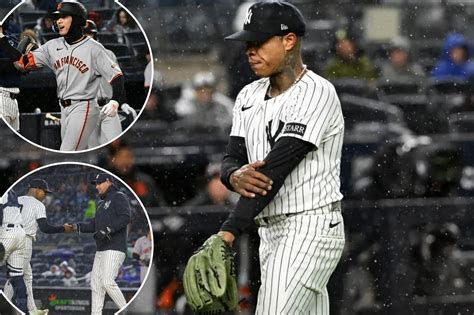 Bill Belichick helps Jordan Hudson perform wild acrobatic pose on beach