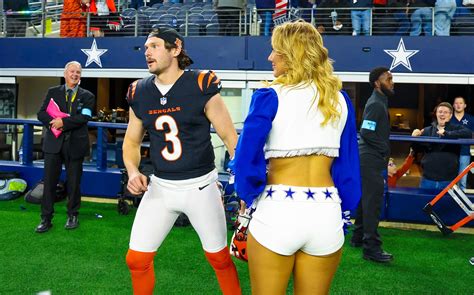 Bengals kicker Cade York kisses Cowboys cheerleader girlfriend Zoe Dale ...