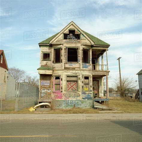 A run-down, abandoned house with graffiti on it, Detroit, Michigan, USA ...