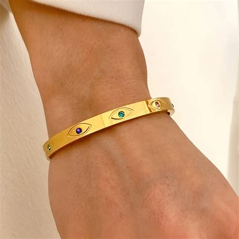 Buy Gold Plated Stainless Steel Evil Eye Themed Anti Tarnish Bangle ...