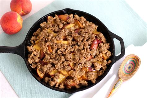 Tipsy Bourbon Peach Crisp in a Cast Iron Skillet - Grill Girl