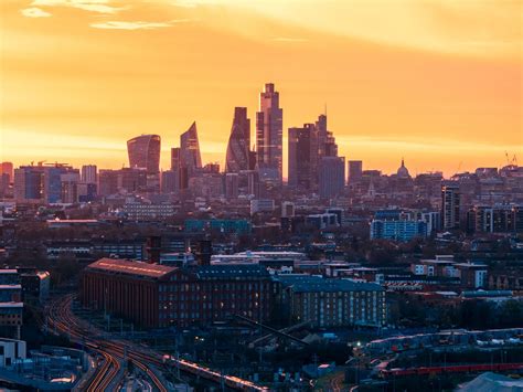 Download wallpaper 1280x960 city, sunset, aerial view, buildings ...