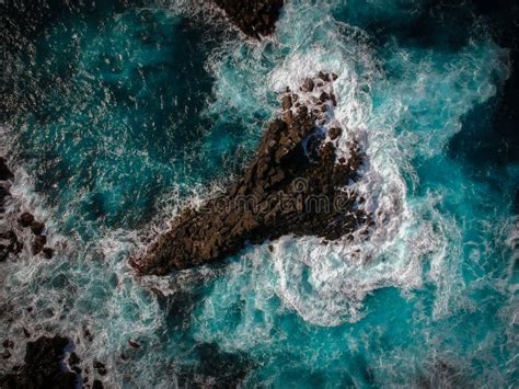 Aerial shots of the turquoise water, reef formations, beach and shipwreck at Henrietta Rocks.