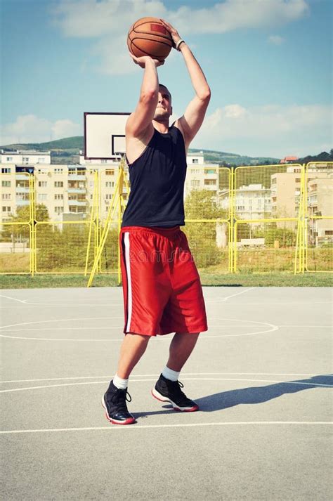 Young Man on Basketball Court. Dribbling with Ball Stock Image - Image ...