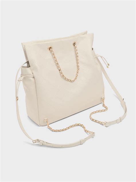 Duo Quilted Drawstring Two-Way Backpack - Cream - CHARLES & KEITH IN