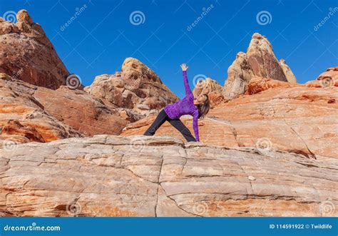 Woman Practicing Yoga in Red Rocks Stock Photo - Image of reflection ...