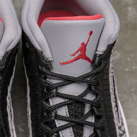 jordan men air jordan 11 retro low ie black fire red cement grey white