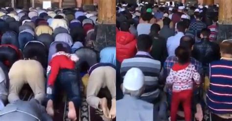 Little Girl Piggybacking On Dad's Back During Namaz Is The Most ...