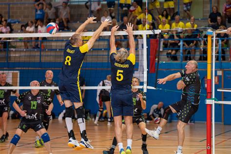 Download Competitive Indoor Volleyball Wallpaper | Wallpapers.com