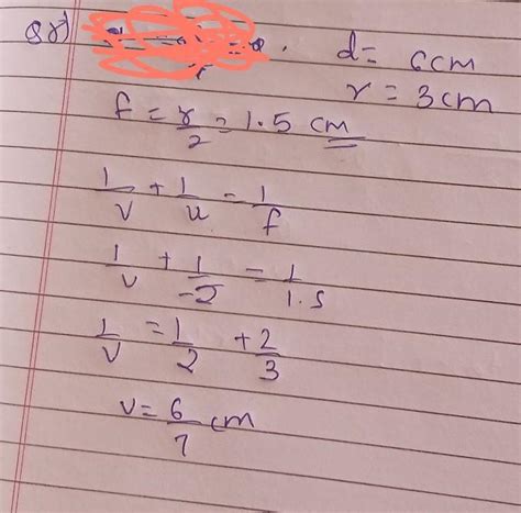 An ornamental silvered ball 6 cm in diameter forms an image of an ...