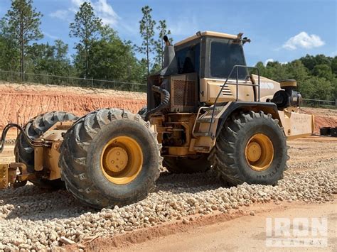 Image result for Bell Scraper Tractor