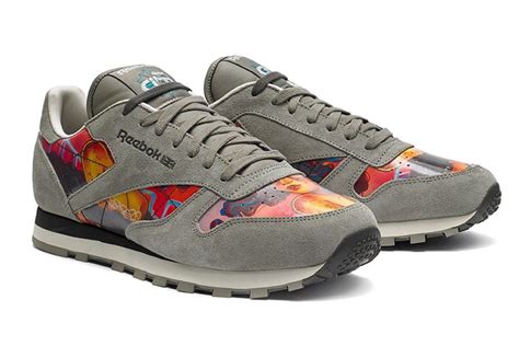 reebok active grey & orange running shoes,www.npssonipat.com