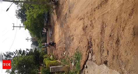 Road repair work pending - Times of India