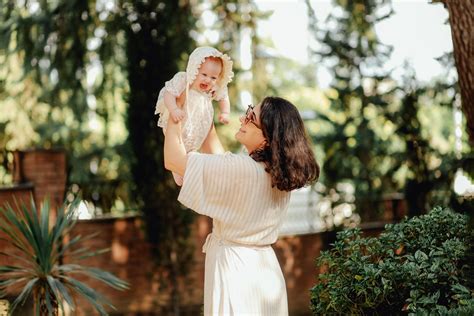 Woman Holding Her Baby · Free Stock Photo