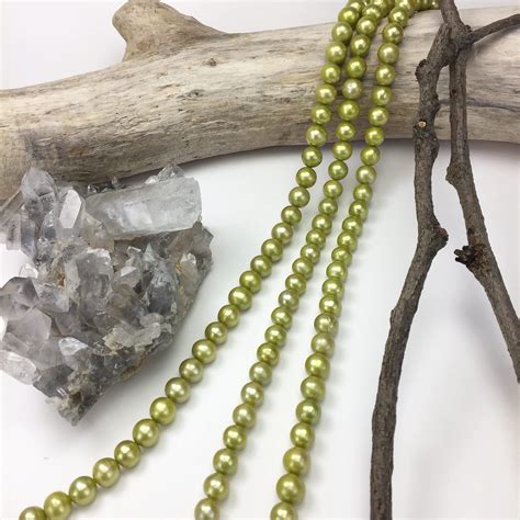 Wholesale FW 8.5x9mm Dyed Iridescent Green Potato Pearls
