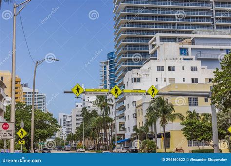 Accentuated Long Pedestrian Crosswalk Sign Hangs Over One of Miami ...