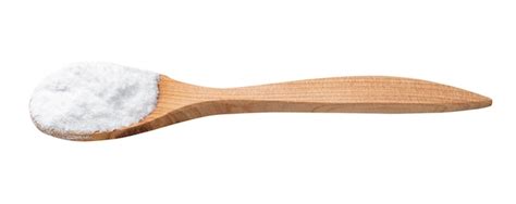 Dextrose sugar in wooden spoon isolated | Premium Photo