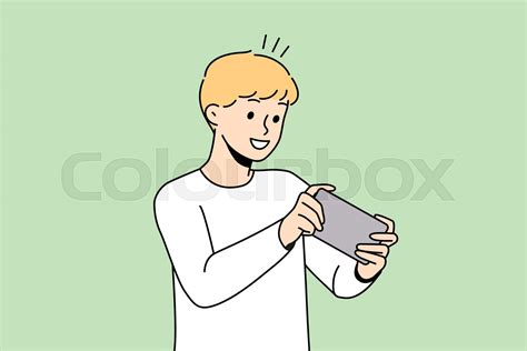 Happy child play video game on smartphone | Stock vector | Colourbox