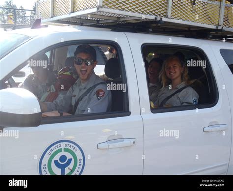 Youth Conservation Corps (YCC) members work together in Yellowstone National Park, contributing ...