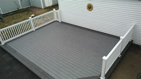 Ground level deck, Trex Pebble Grey decking with Trex clam shell border ...