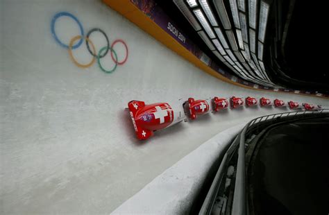 Switzerland’s pilot Meyer and Mayer speed down the track during the women’s bobsleigh event at ...