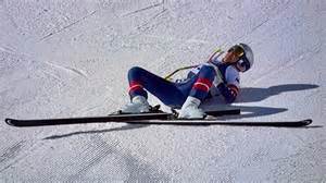 United States' Lindsey Vonn crashes into a gate during an alpine ski women's downhill race, at the 2026 Winter Olympics, in Cortina d'Ampezzo, Italy, Sunday, Feb. 8, 2026. (AP Photo/Jacquelyn Martin)