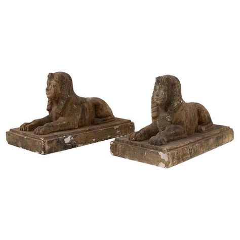 Pair of Egyptian-style gold-coloured sculpted scaiola plaster sphinxes ...
