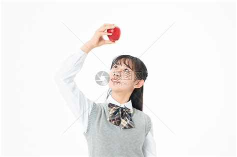 初中生女生拿着苹果高清图片下载-正版图片501634597-摄图网